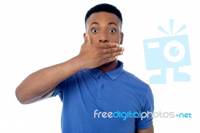 Surprised Young Man Looking At Camera Stock Photo