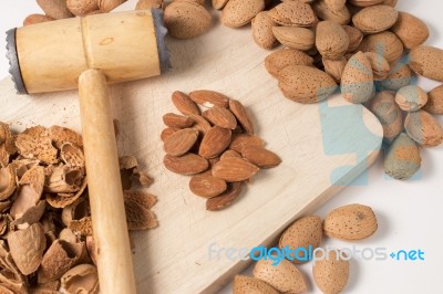 Sweet Almonds With Hammer Stock Photo