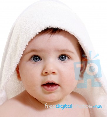 Sweet Baby Face Under Towel Stock Photo