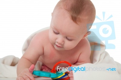 Sweet Little Baby Playing With Toy Stock Photo