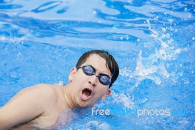 Swimmer Breathing Performing The Crawl Stroke Stock Photo