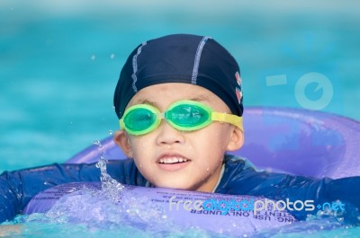 Swimming Kid Stock Photo