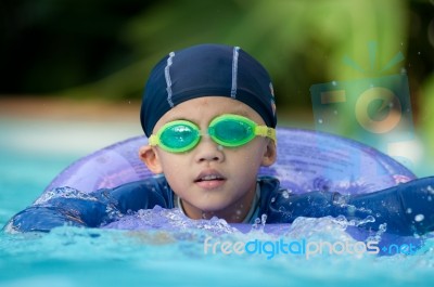 Swimming Kid Stock Photo
