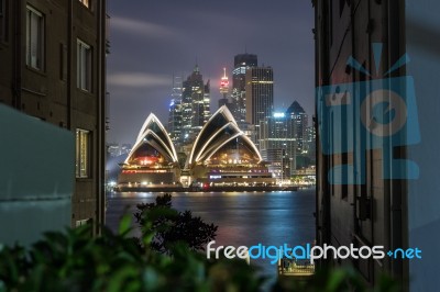 Sydney Opera House Illumnitated By Lights At Night Stock Photo