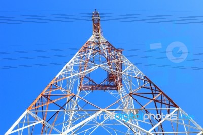 Symmetry Of High Voltage Electric Power Line Tower Metal Structu… Stock Photo