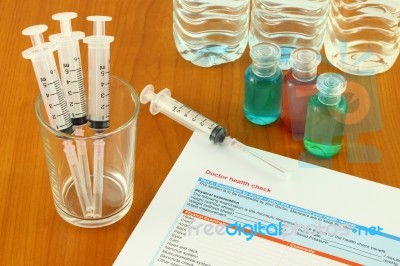 Syringe And Bottle Stock Photo