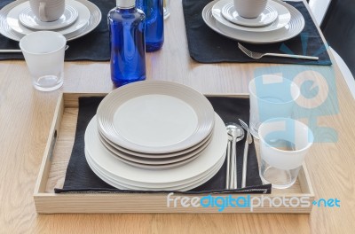 Table Set On Wooden Table In Dinning Room Stock Photo