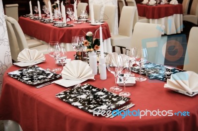 Tables Set For Dinner In Modern Restaurant Stock Photo