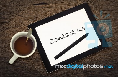 Tablet And Coffee Cup Stock Photo