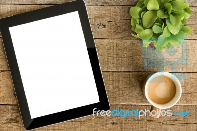Tablet White Screen Display And Coffee On Wood Table Stock Photo