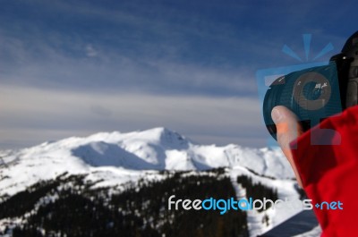 Taking A Photo Of Mountains Covered With Snow Stock Photo
