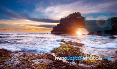 Tanah Lot Temple At Sunset In Bali, Indonesia.(dark)seascape Stock Photo