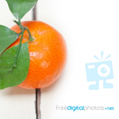 Tangerine Mandarin Orange On White Table Stock Photo