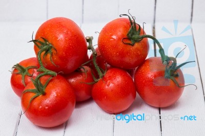 Tasty Pile Of Wet Tomatoes Stock Photo