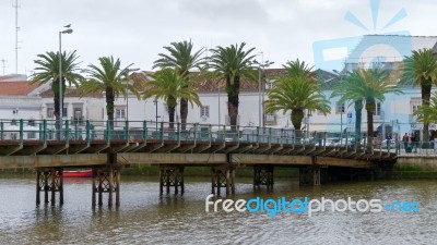 Tavira, Southern Algarve/portugal - March 8 : Bridge Over The Ri… Stock Photo