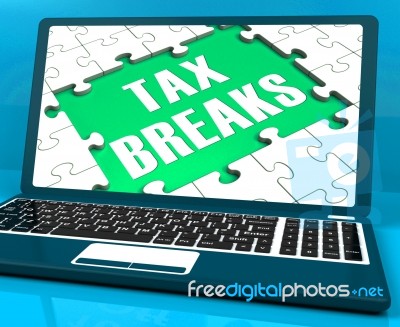 Tax Breaks On Laptop Showing Internet Taxing Stock Image