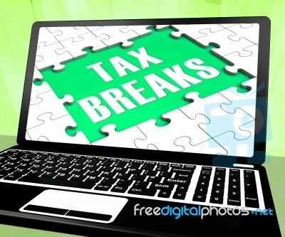 Tax Breaks On Laptop Shows Internet Paying Stock Image