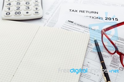 Tax Return Form 2015 With Notebook Stock Photo