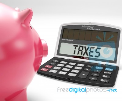 Taxes On Calculator Shows Income Tax Return Stock Image