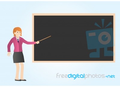 Teacher Pointing At Blackboard Stock Image