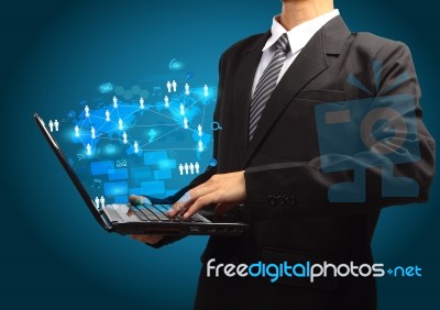 Technology Business Concept On Computer Laptop In The Hands Stock Image