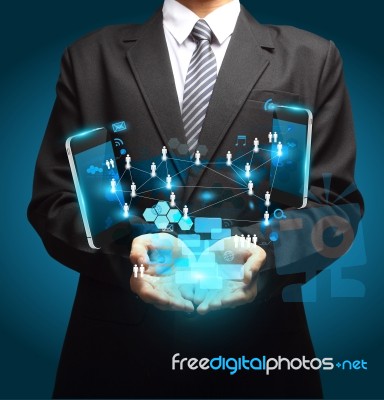 Technology In The Hands Of Businessmen Stock Image