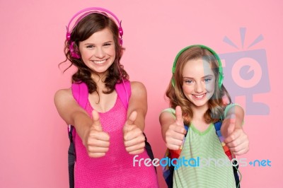 Teen Girls Showing Thumbs Up Stock Photo
