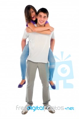 Teenage Boy Piggybacking Girl Stock Photo