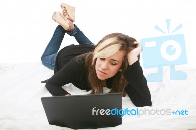 Teenage Girl Working With Laptop Stock Photo