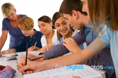 Teenage Students Discussing Stock Photo