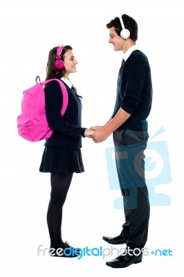 Teenage Students Enjoying Music Stock Photo