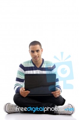 Teenager Guy Working On Laptop Stock Photo