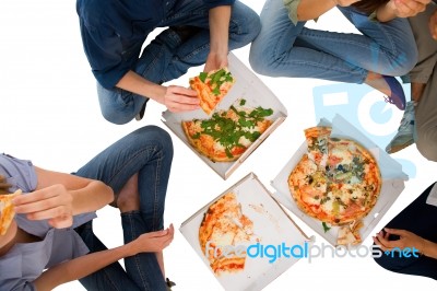 Teenagers Eating Pizza Stock Photo