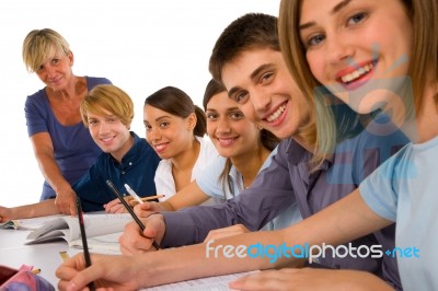Teenagers In Classroom Stock Photo