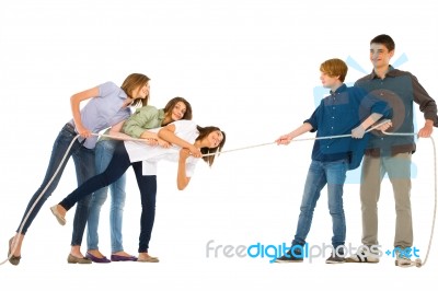 Teenagers Playing Tug Of War Stock Photo