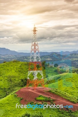 Telecommunication Tower On The Road Middle Of  Mountain Backgrou… Stock Photo