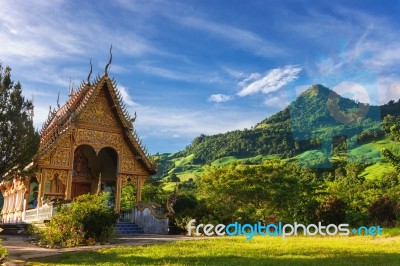 Temple In Thailand Near Mountain Valley During Sunrise Natural S… Stock Photo Temple In Thailand Near Mountain Valley During Sunrise Natural S… Stock Photo