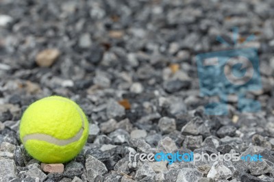 Tennis Balls Lay On The Gravel Stock Photo