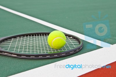 Tennis Court With Ball And Racket Stock Photo