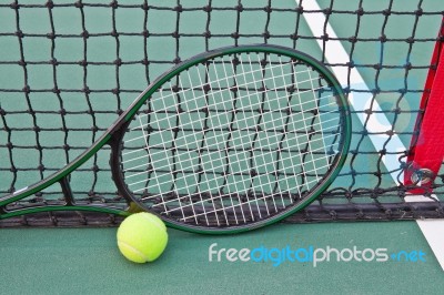 Tennis Court With Ball And Racquet Stock Photo