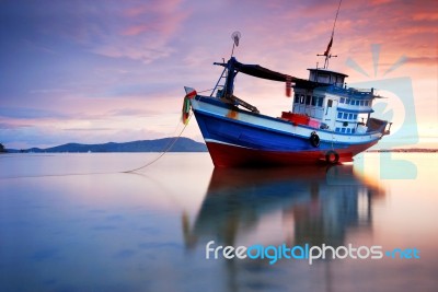 Thai Fishing Boat At Sunset Stock Photo