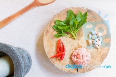 Thai Food Ingredient Include Pork And Basil And Chili And Garlic On Wooden Cutting Board Stock Photo