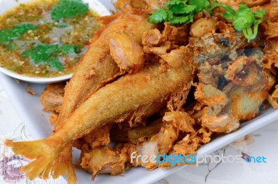 Thai Food Name Is Deep Fried Silver Banded Fish With Garlic Pepp… Stock Photo