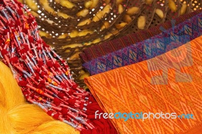 Thai Silk Cloths And Raw Silk Threads Material Stock Photo