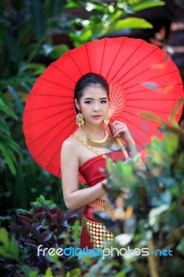 Thai Woman In Traditional Costume Stock Photo