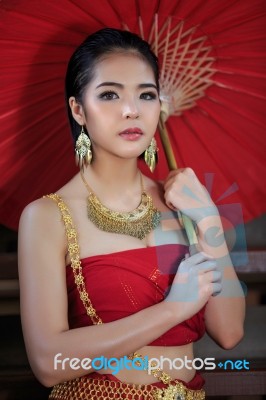 Thai Woman In Traditional Costume Stock Photo