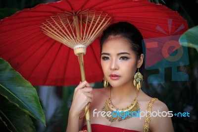 Thai Woman In Traditional Costume Stock Photo