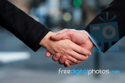 The Deal Is On. Business Handshake Stock Photo