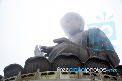 The Enormous Tian Tan Buddha Statue At High Mountain Near Po Lin Monastery, Lantau Island, Hong Kong Stock Photo