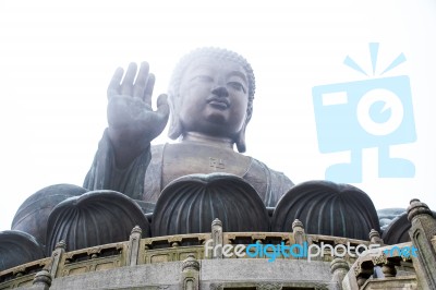 The Enormous Tian Tan Buddha Statue At High Mountain Near Po Lin Monastery, Lantau Island, Hong Kong Stock Photo